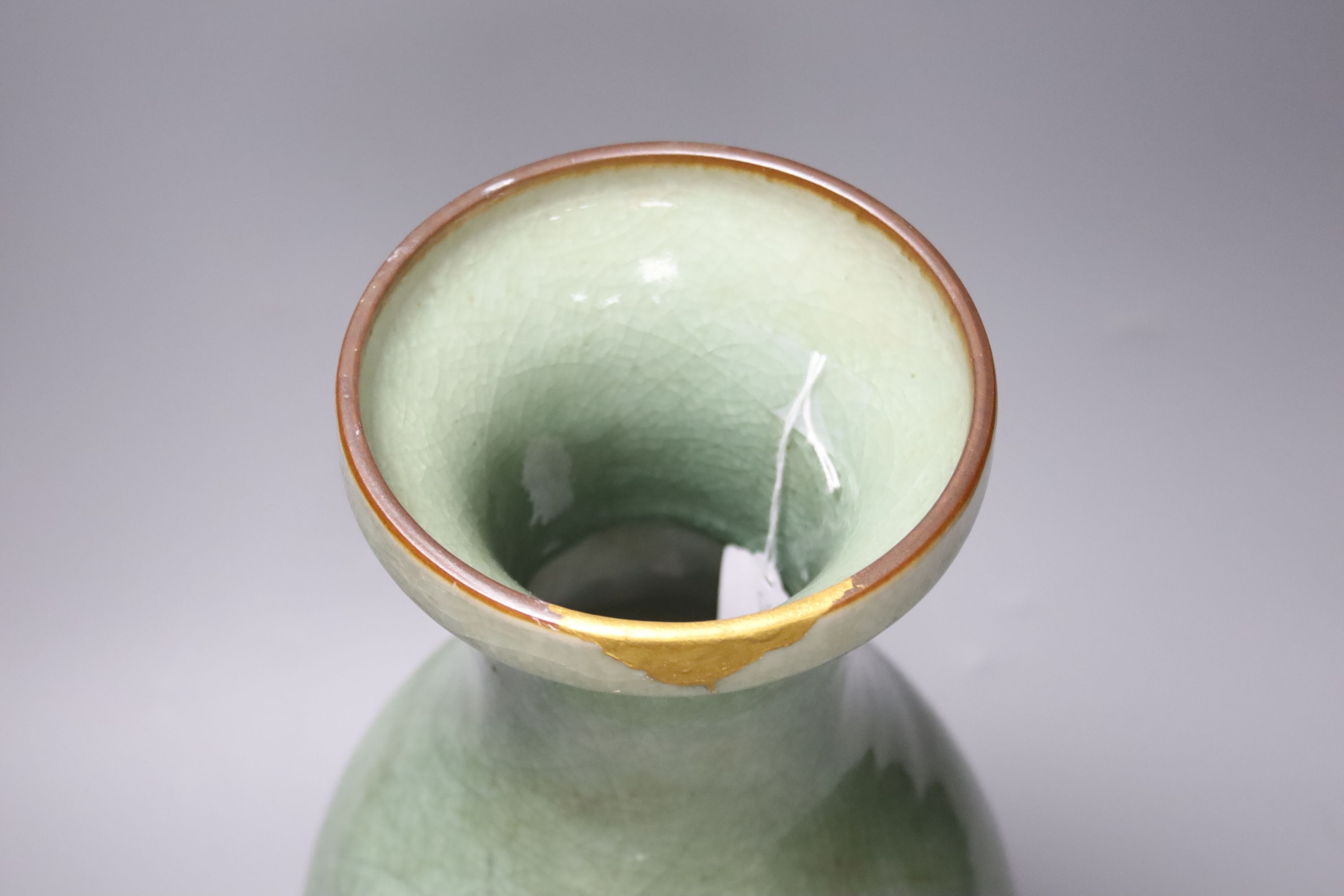 A Chinese celadon crackleglaze vase, probably 17th century or earlier, height 38cm